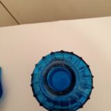 Polished in blue glass
