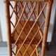Old shelf on vintage rattan stands