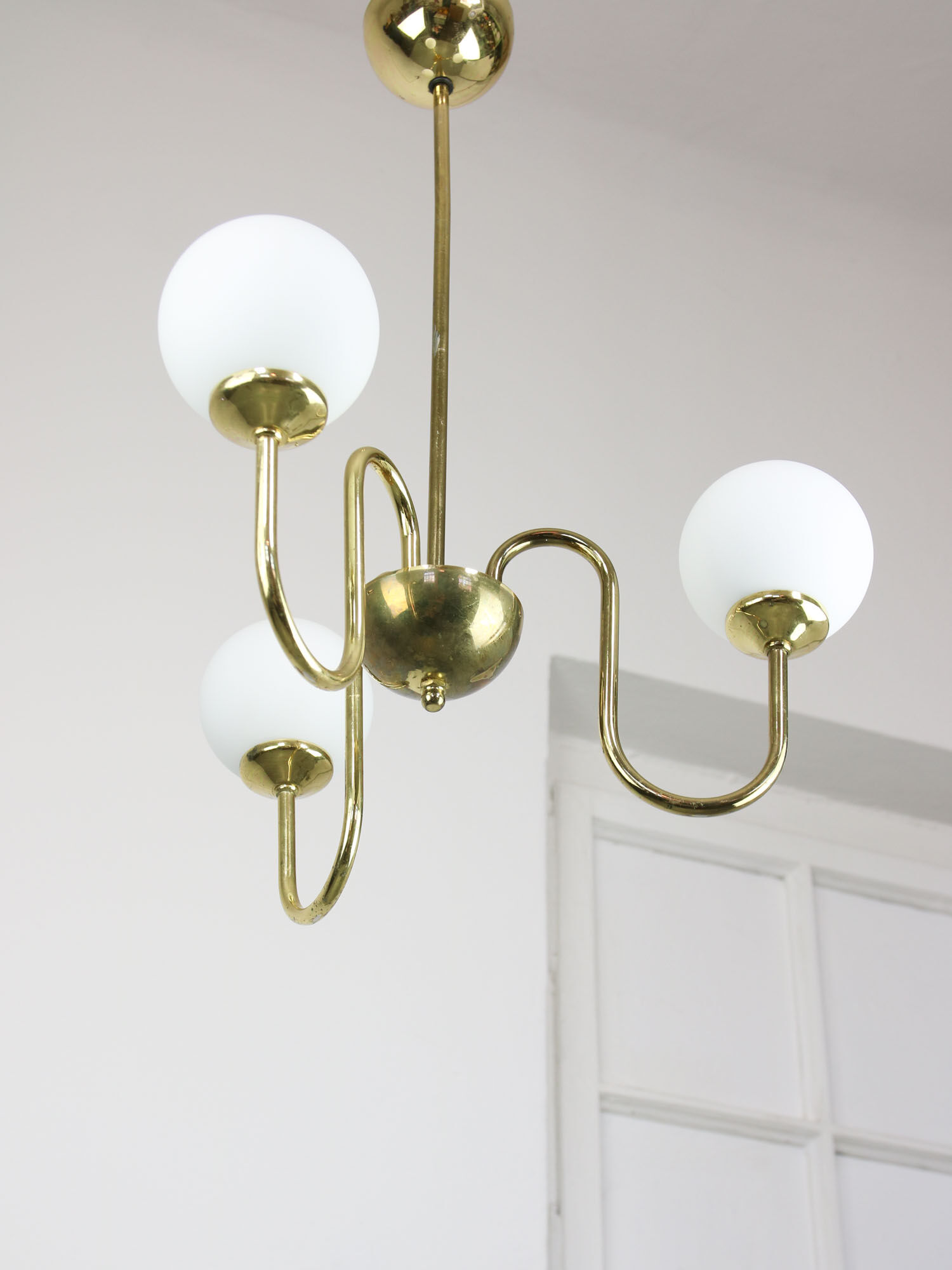 Vintage golden chandelier in opaline glass