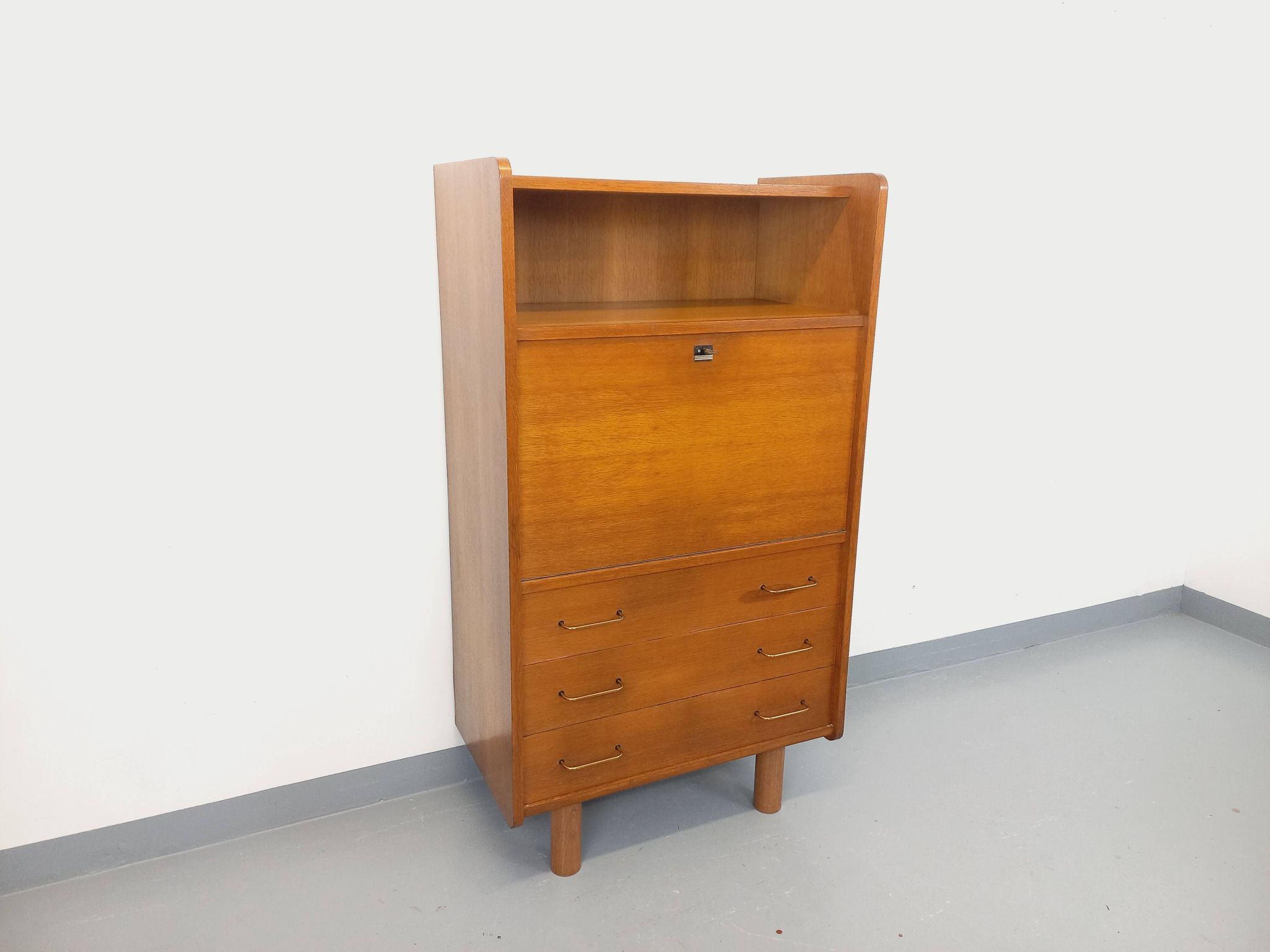 Vintage oak secretary storage furniture from the 1950s and 60s.