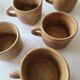 Lot 5 tasses à café et sous tasses en grès
