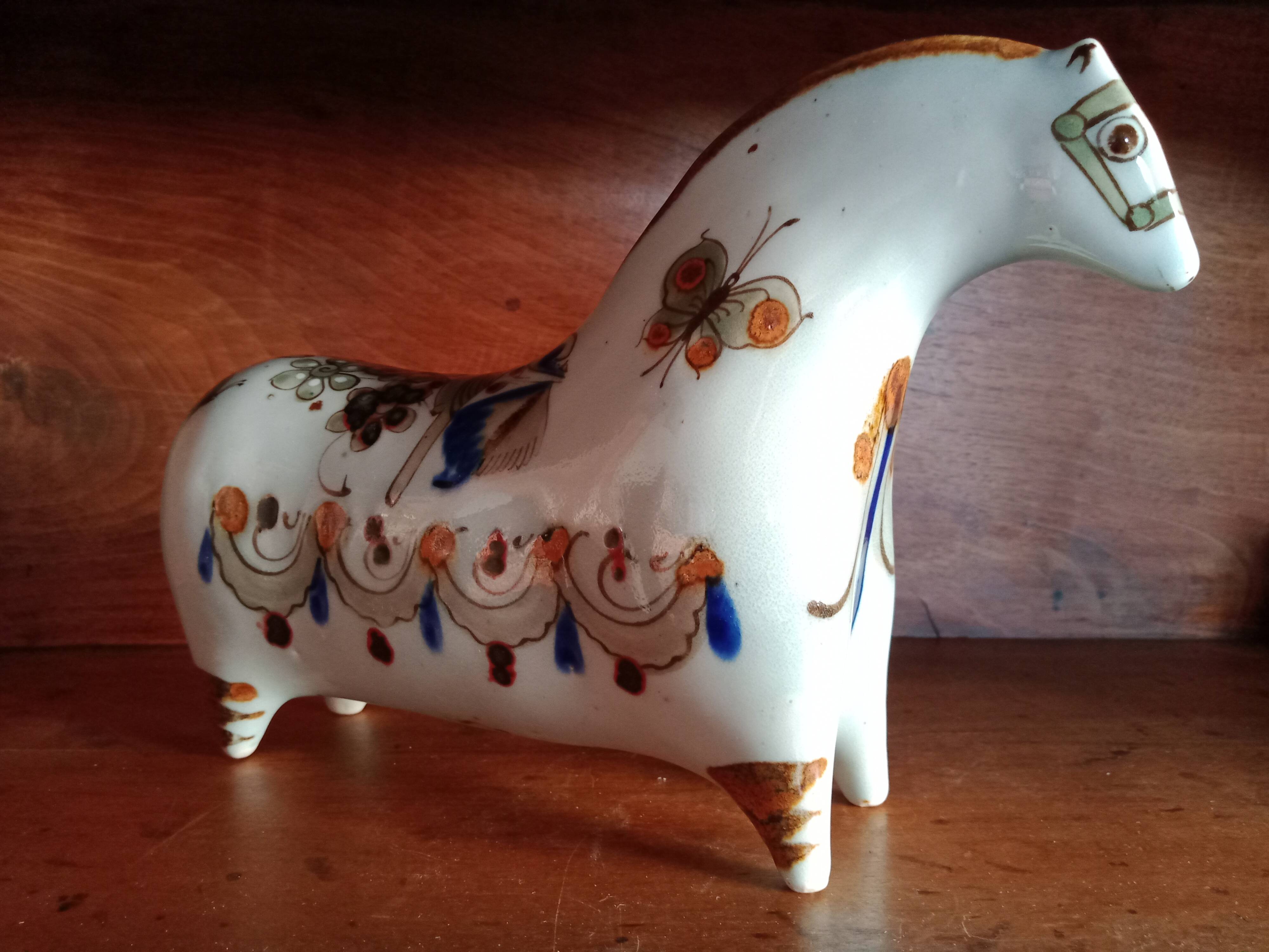 Ken edwards pottery - stylized horse decorated with butterfly flowers bird
