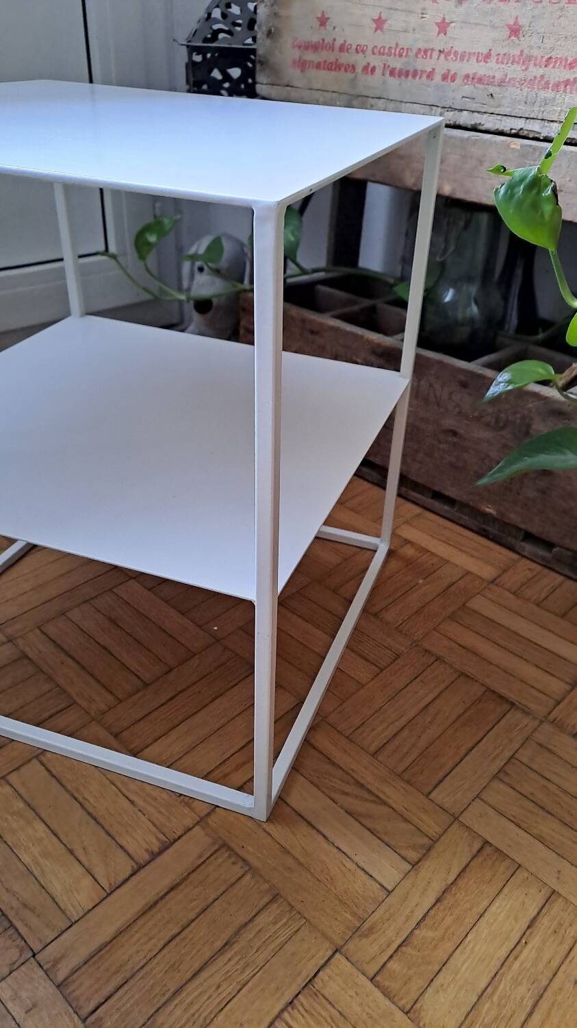 Metal coffee table with two levels.