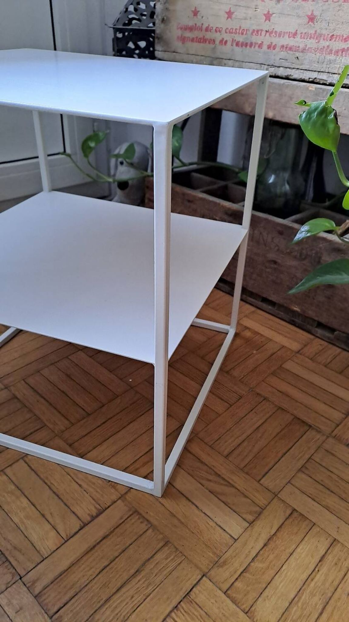 Metal coffee table with two levels.