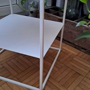 Metal coffee table with two levels.