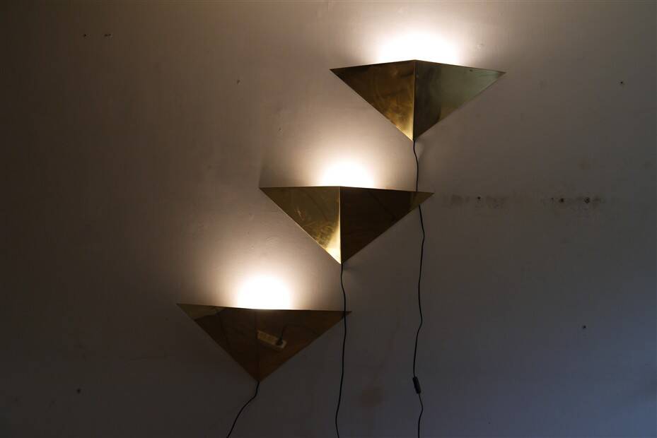 Minimalist brass wall lights