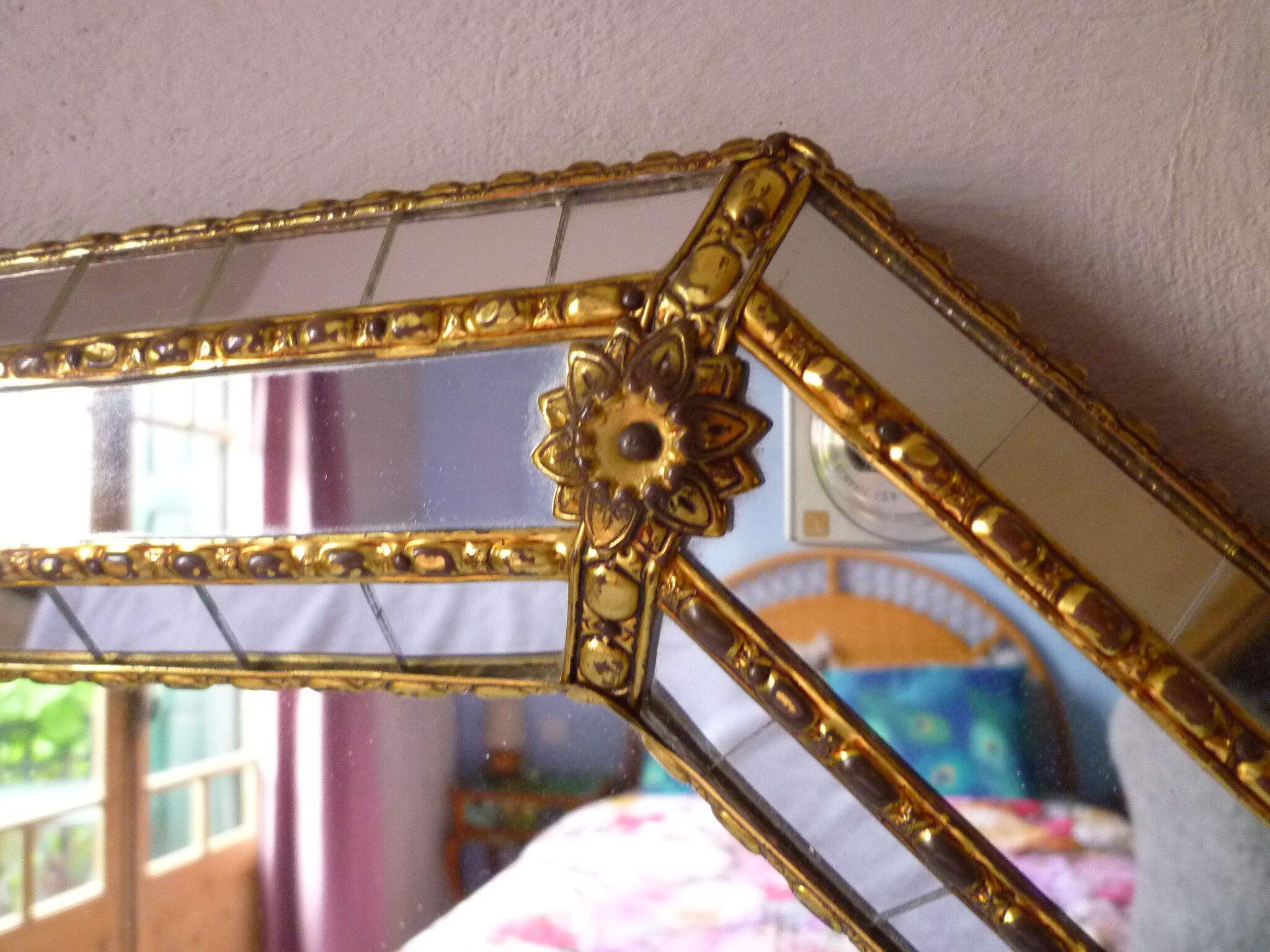 Octagonal mirror with facets  81x60cm