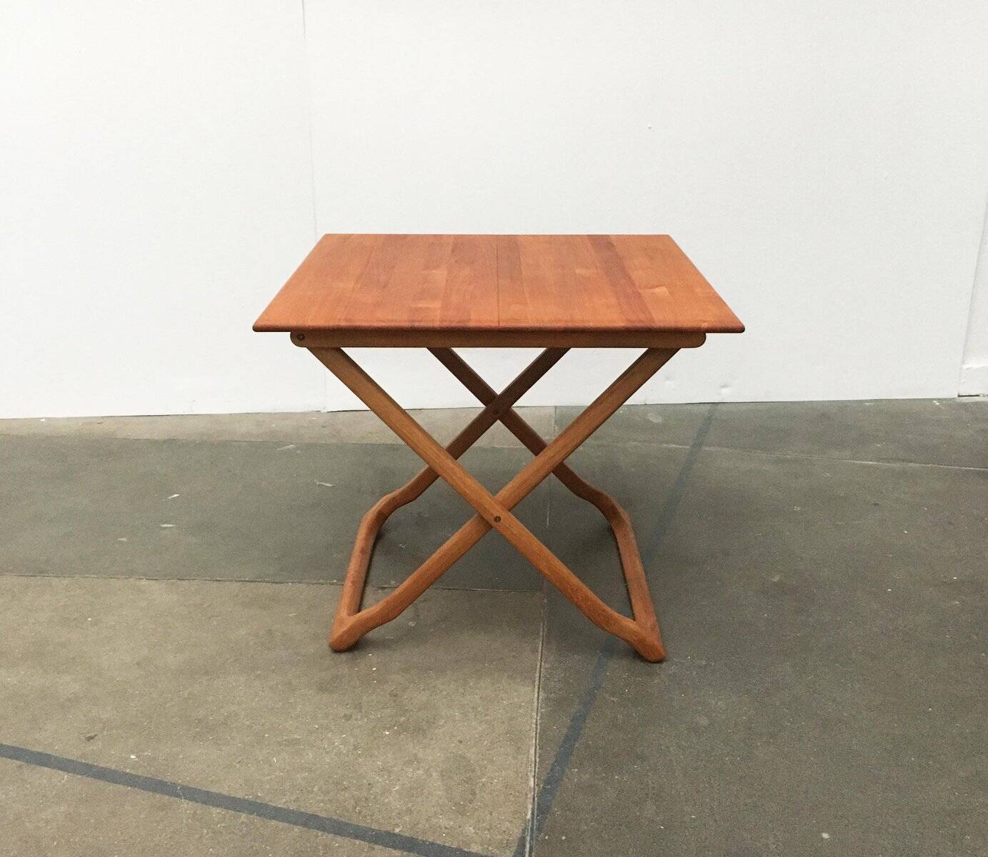 Danish folding table in teak from the mid-century by Juul Kristensen.