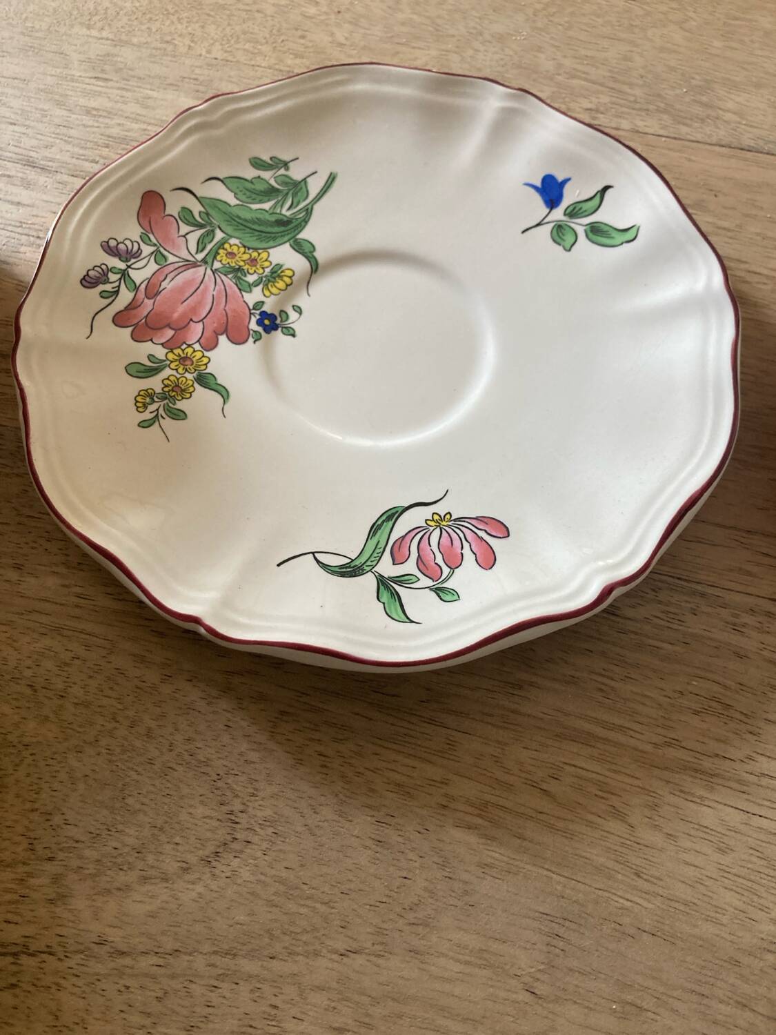 Two luneville cups with saucer