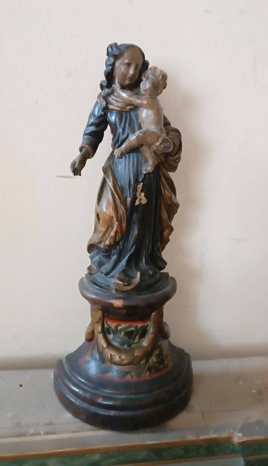 Ancient polychrome wooden sculpture representing the Virgin and Child, from