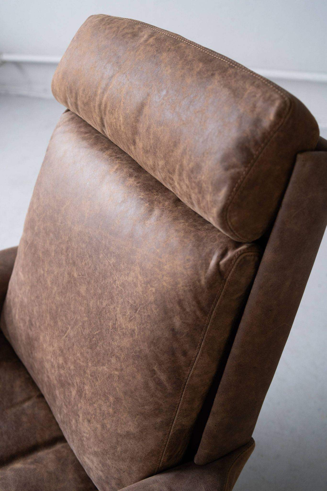 Vintage swing armchair and stool in leather by reinhold adolf for cor, 1970s, set of 2