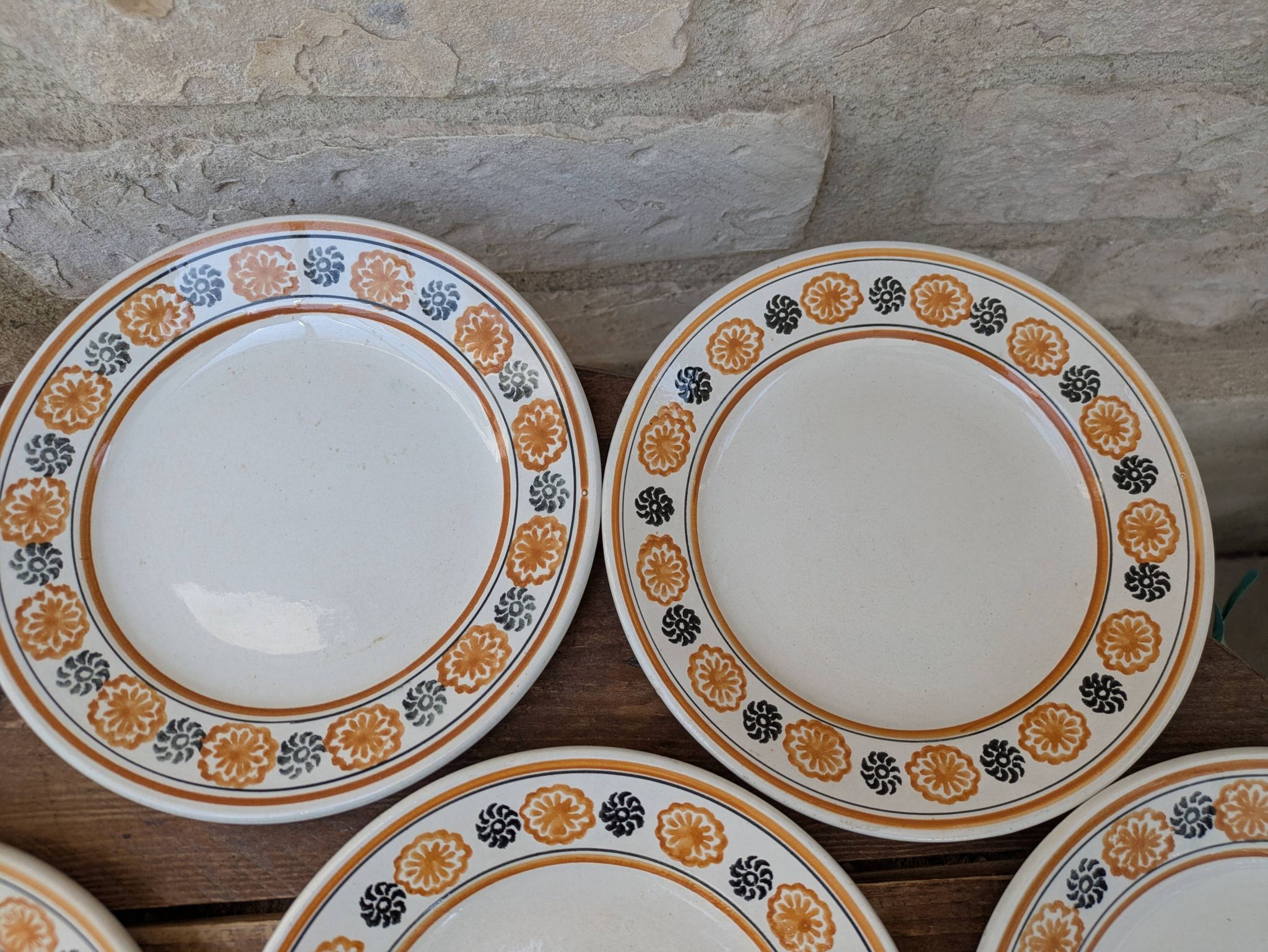 10 dessert plates Saint Amand Amandinoise frilled with orange and black flowers.