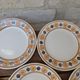 10 dessert plates Saint Amand Amandinoise frilled with orange and black flowers.