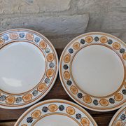 10 dessert plates Saint Amand Amandinoise frilled with orange and black flowers.