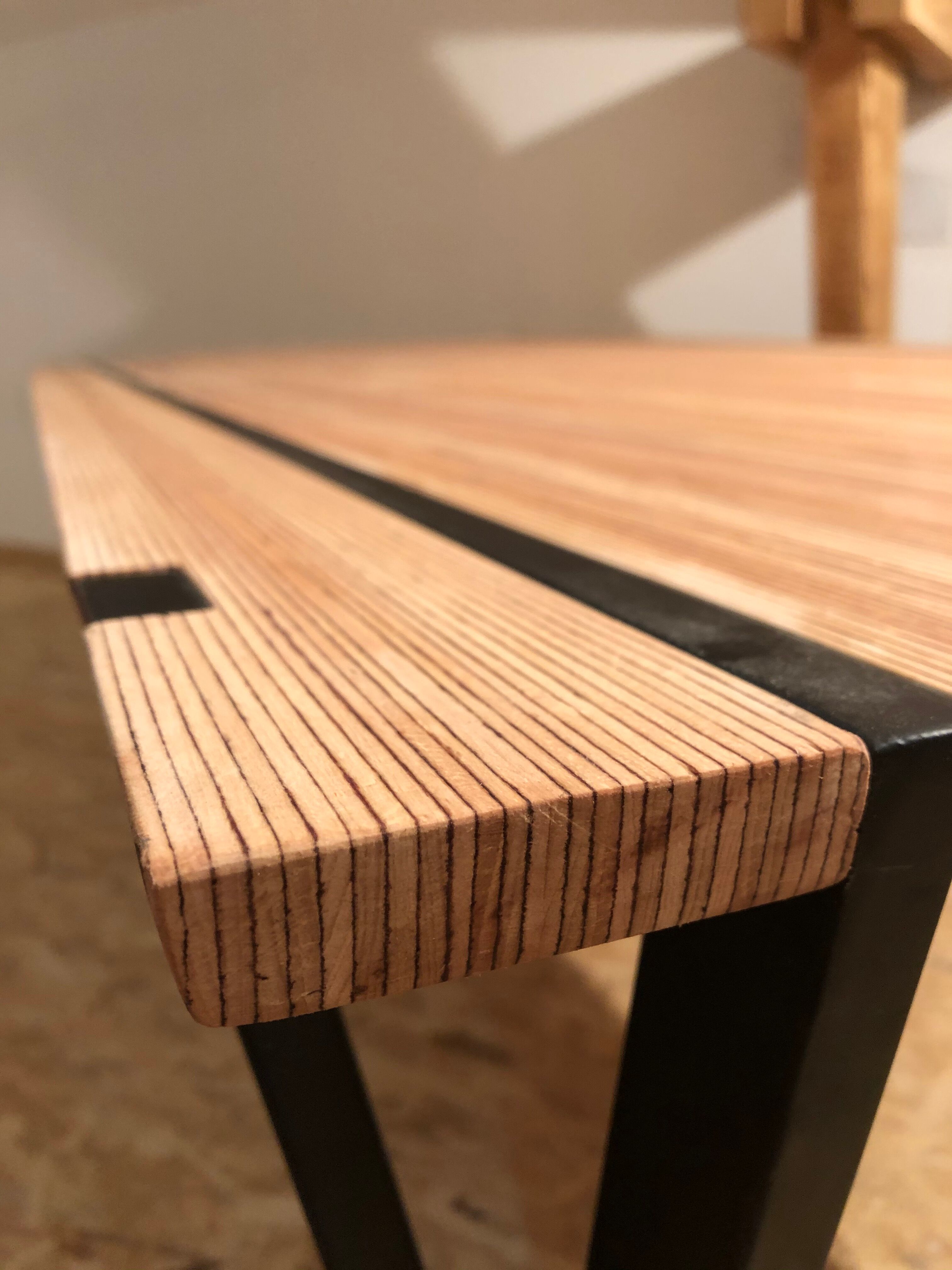 Multiline beech design table and matte black steel