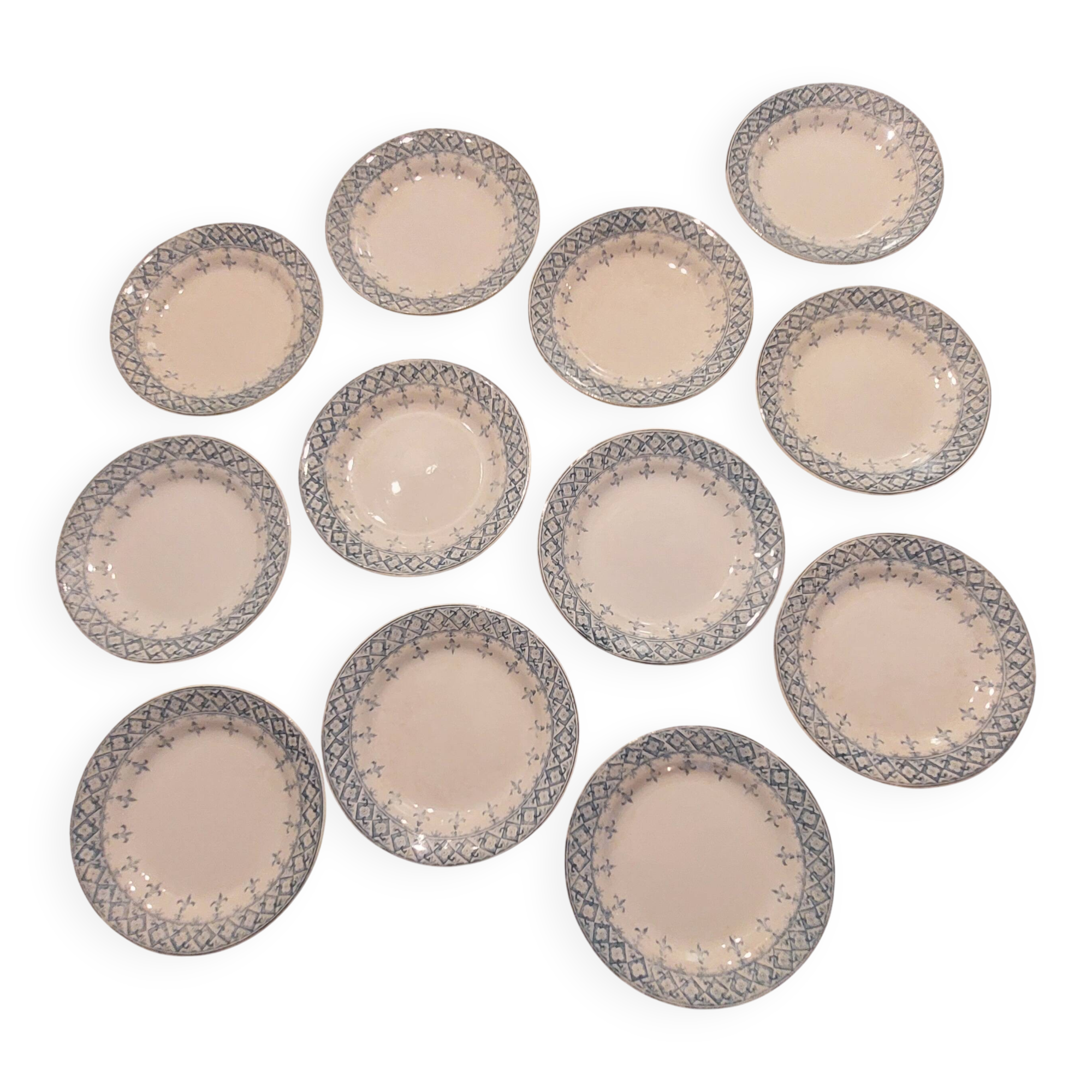 Set of 12 ironstone plates model "Andrée", Creil and Montereau, 23cm