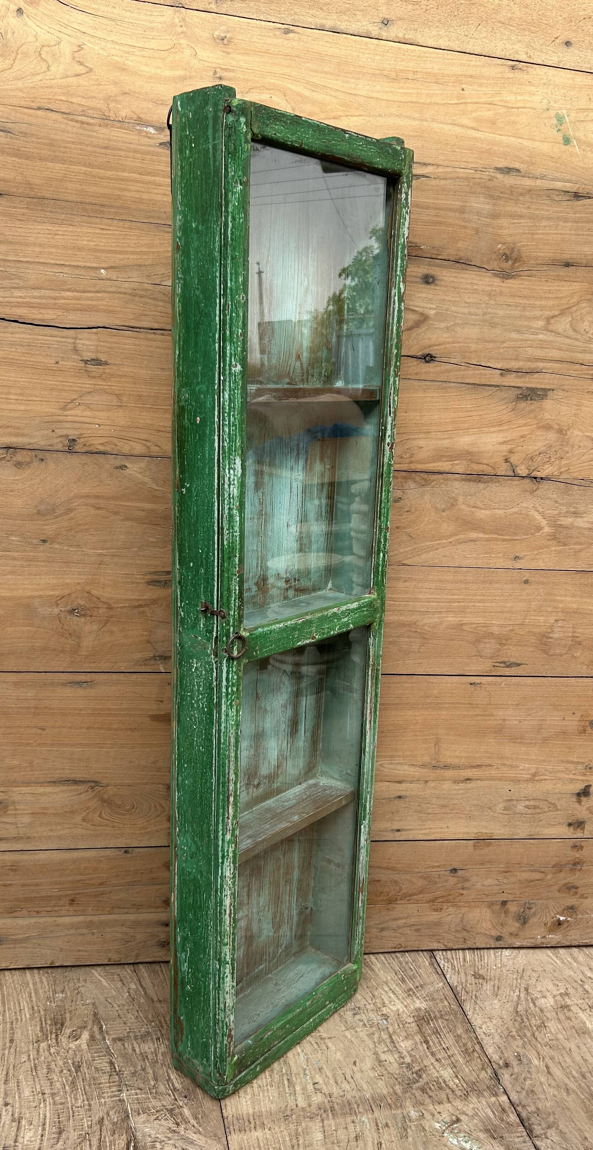 Wall display cabinet in Burmese teak with original patina.