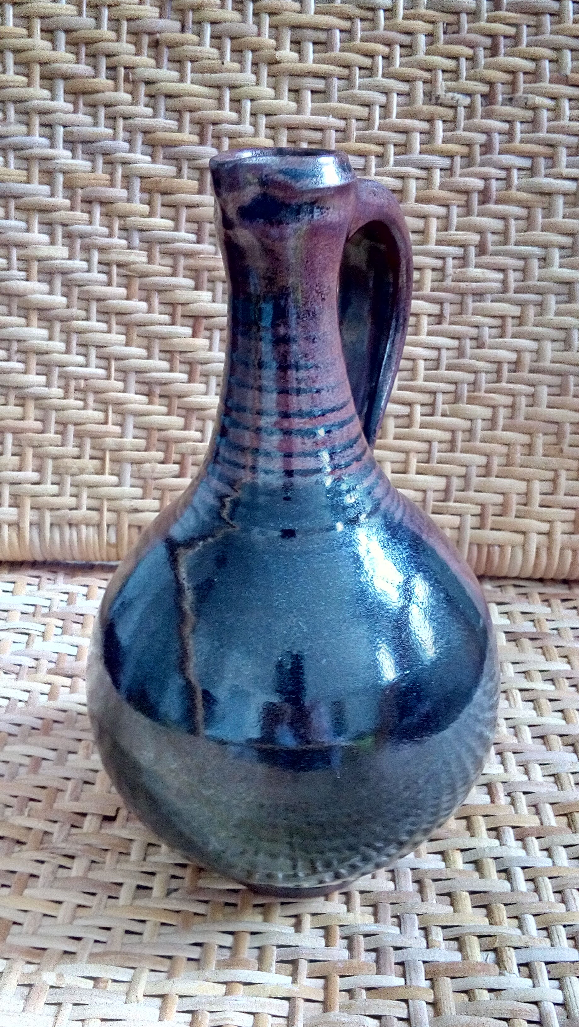 Glazed earthenware carafe