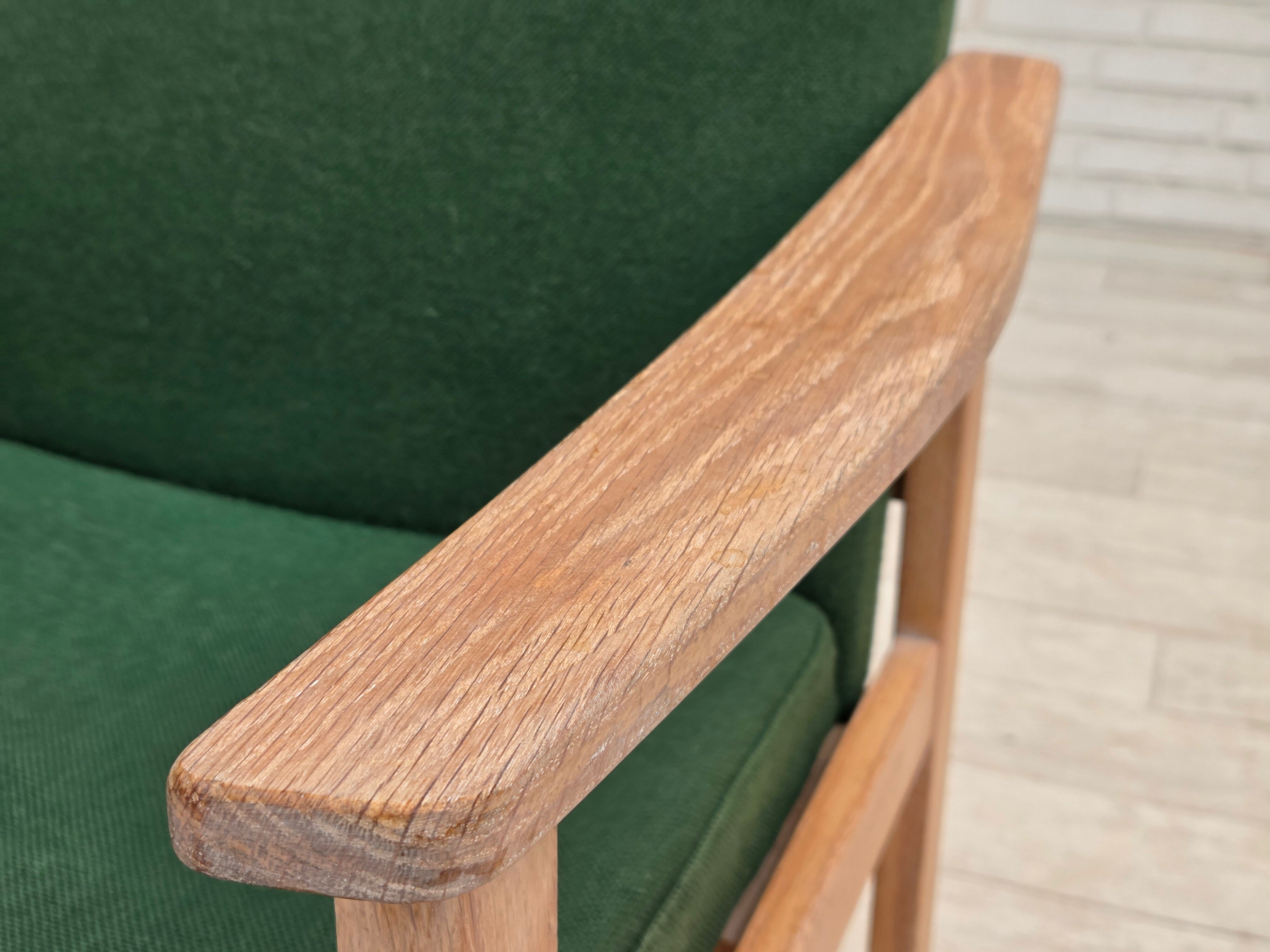 1980s, Danish armchair by Høng Stole, green furniture wool, oak wood.