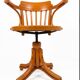 Swivel office chair in curved wood, 1950s