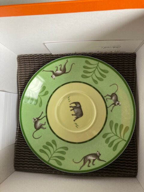 Two Hermès breakfast cups in their packaging