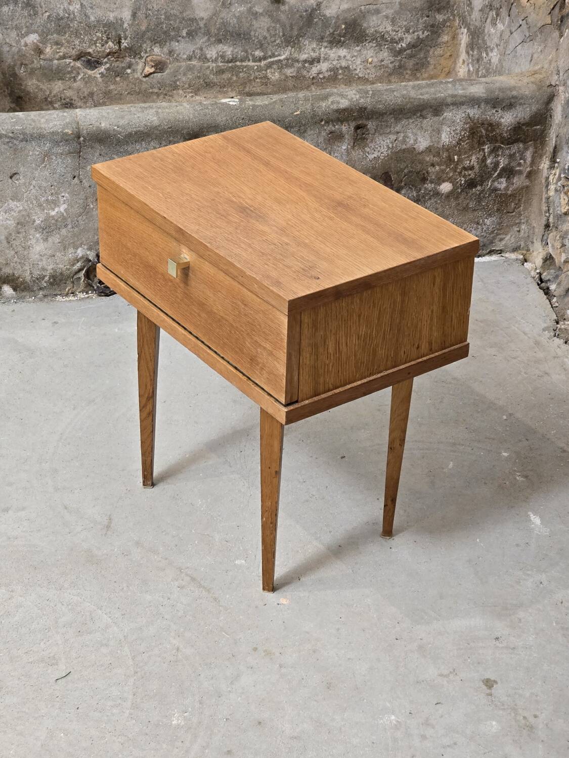 Scandinavian bedside table with hinged drawer