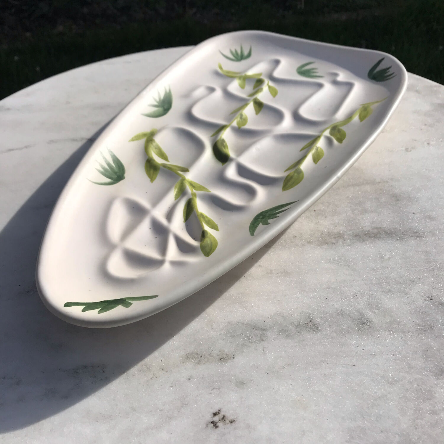 Vintage dish stylized leaf patterns