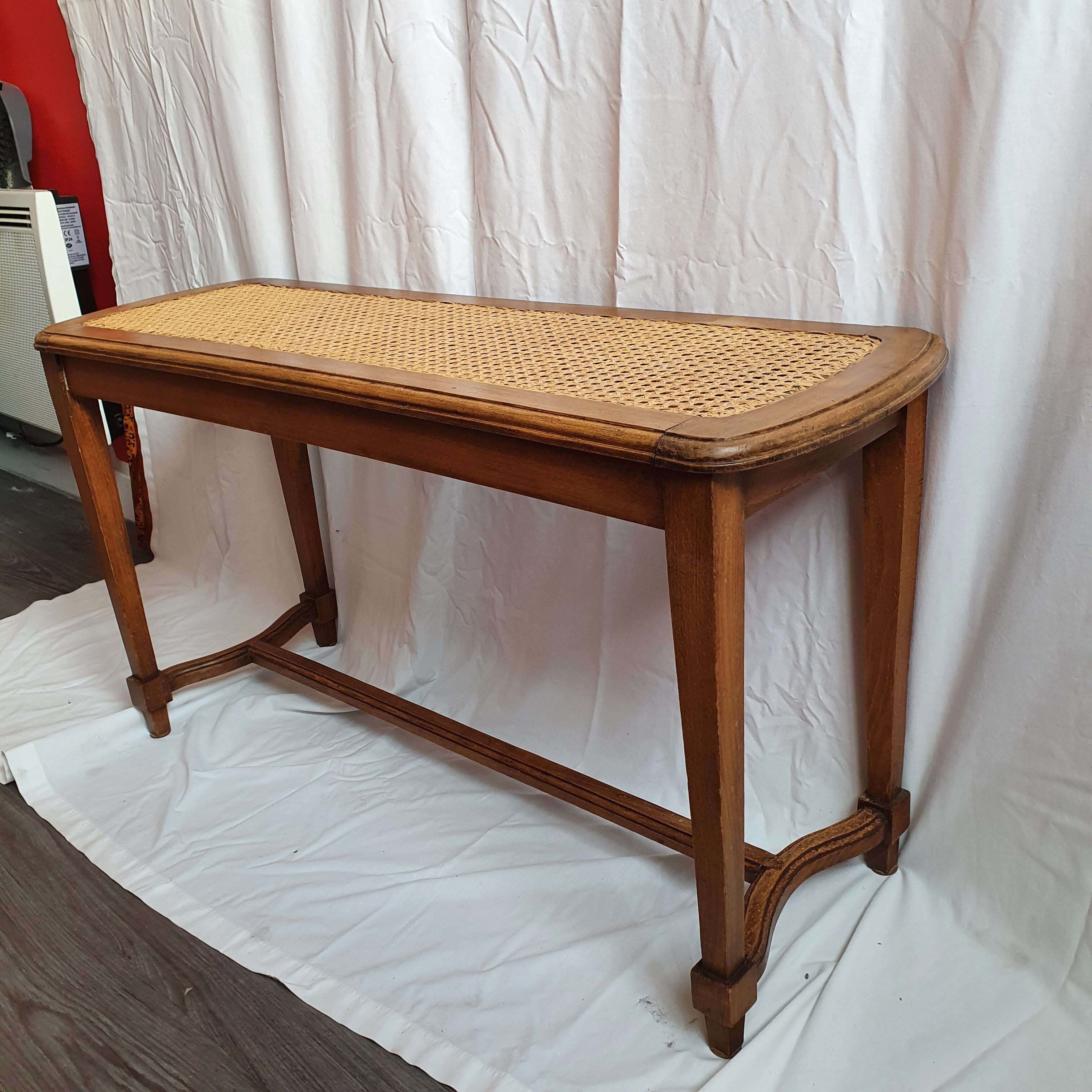 Rattan piano bench
