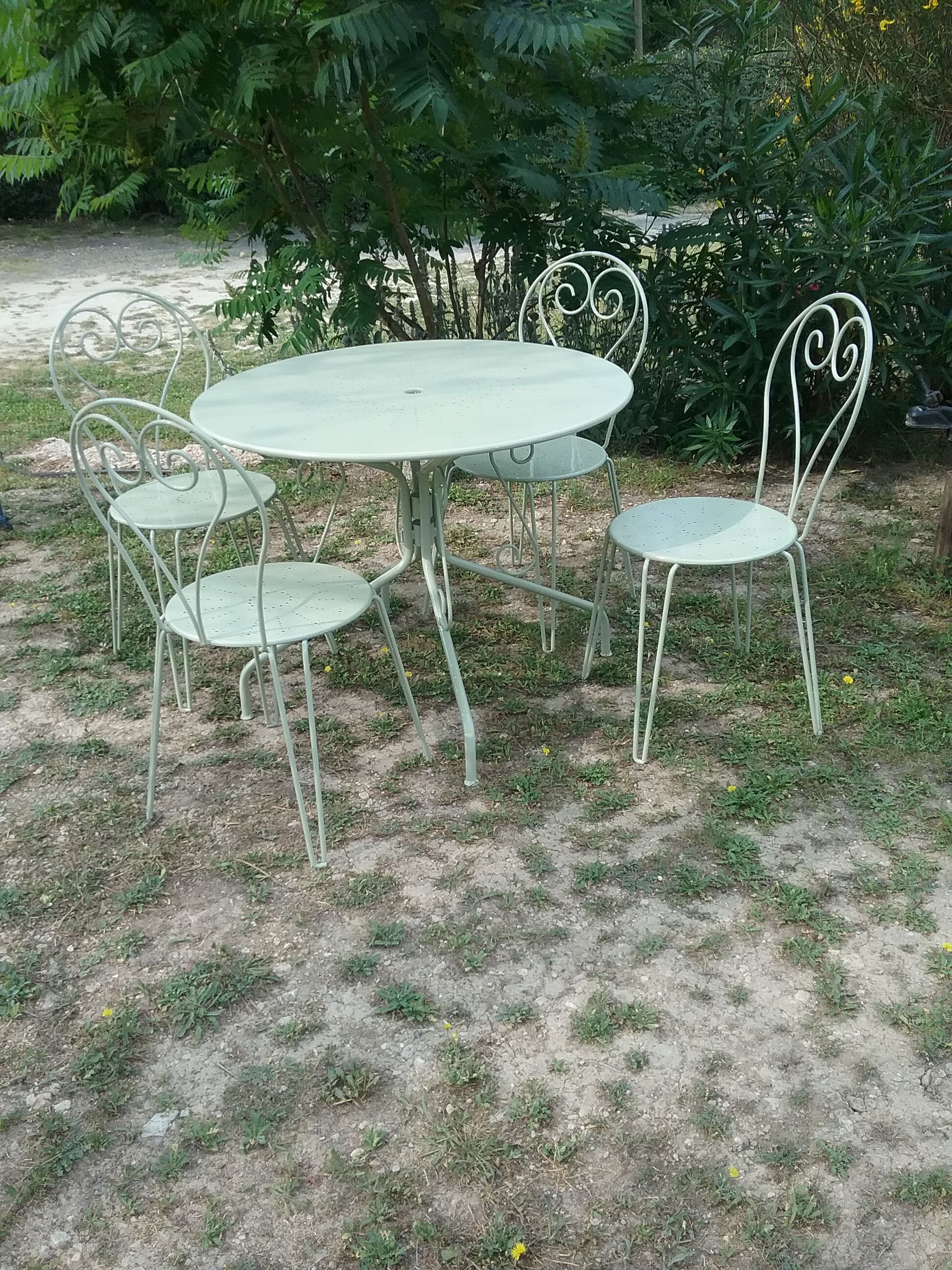 Green wrought iron garden furniture