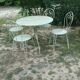 Green wrought iron garden furniture