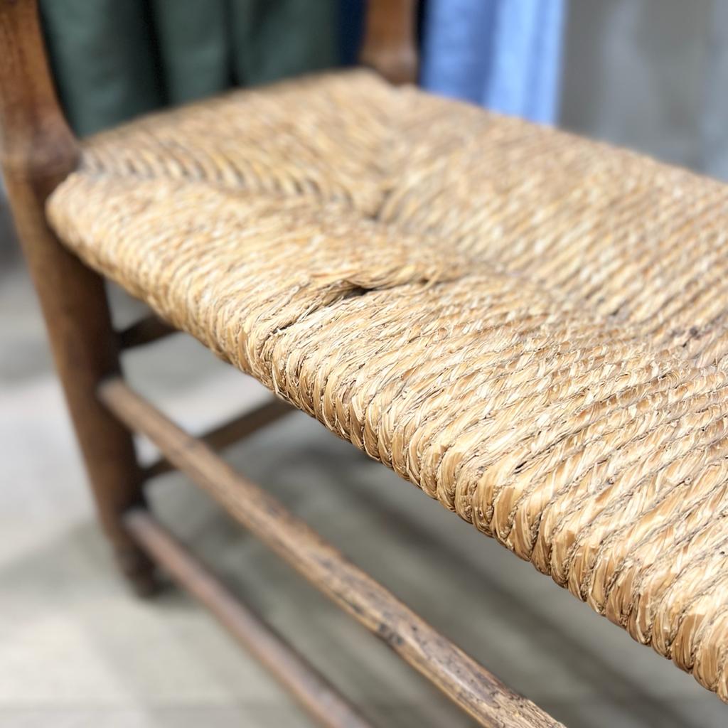 Straw bench and vintage wood