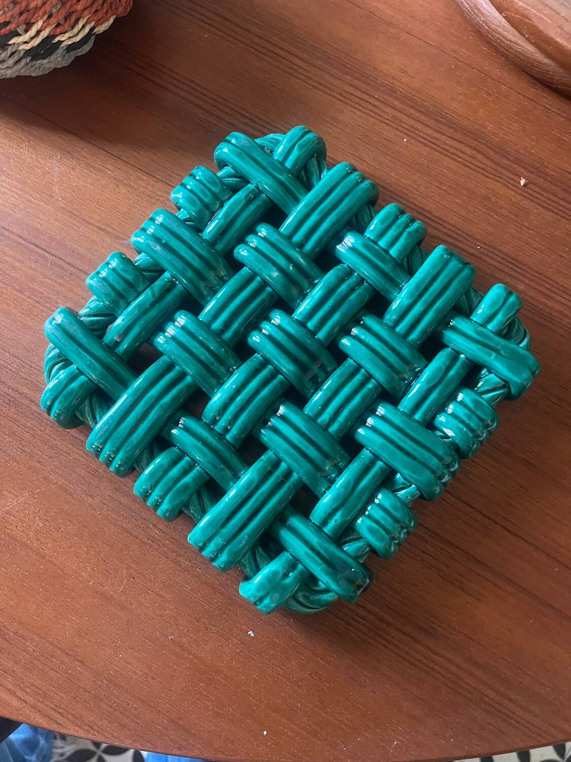 Woven ceramic trivet