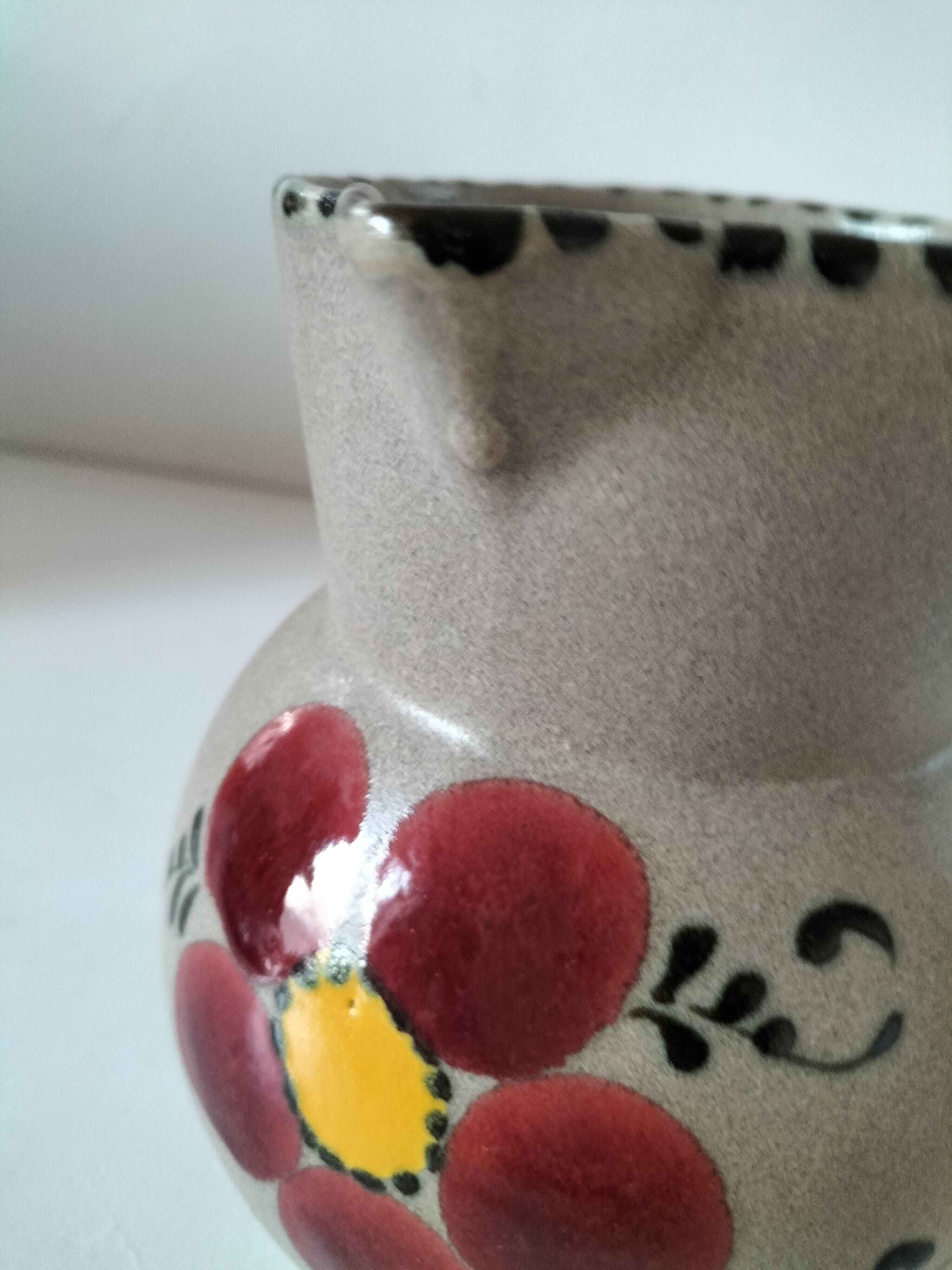 Vintage stoneware pitcher with hand-painted floral decoration, 1960s–70s