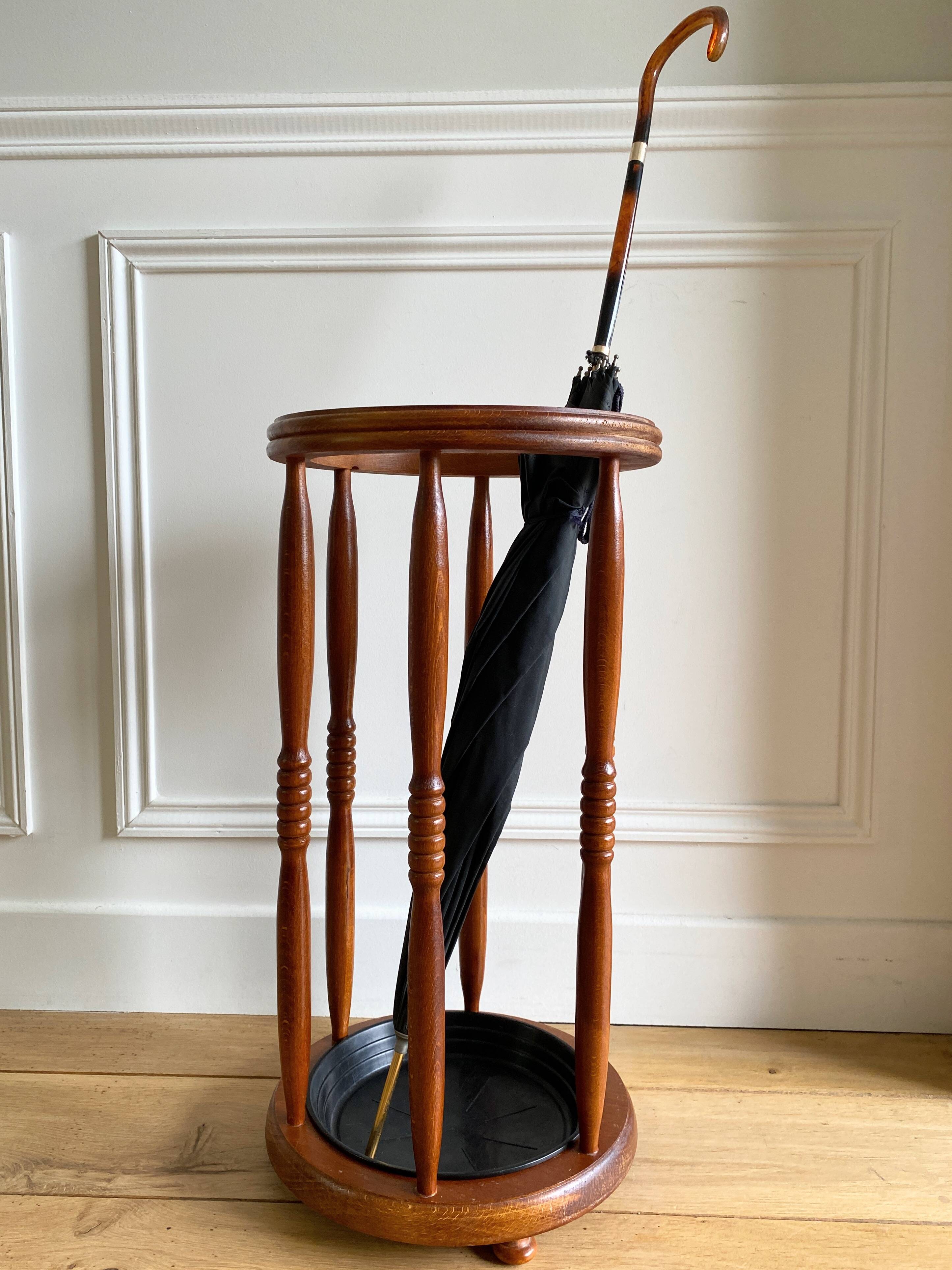 Vintage round wooden umbrella stand