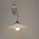 Old suspension, said rises and falls with serrated white opaline