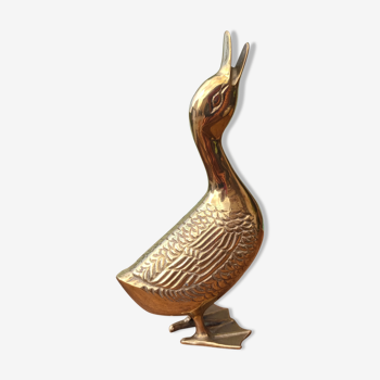 Large vintage duck in golden brass