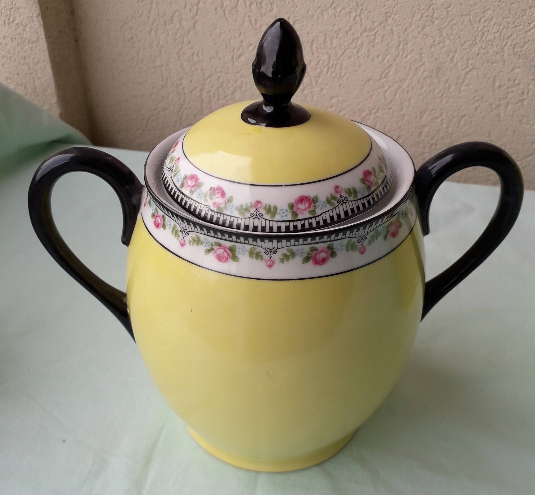 Coffee pot or teapot, sugar bowl and milk jug in porcelain.