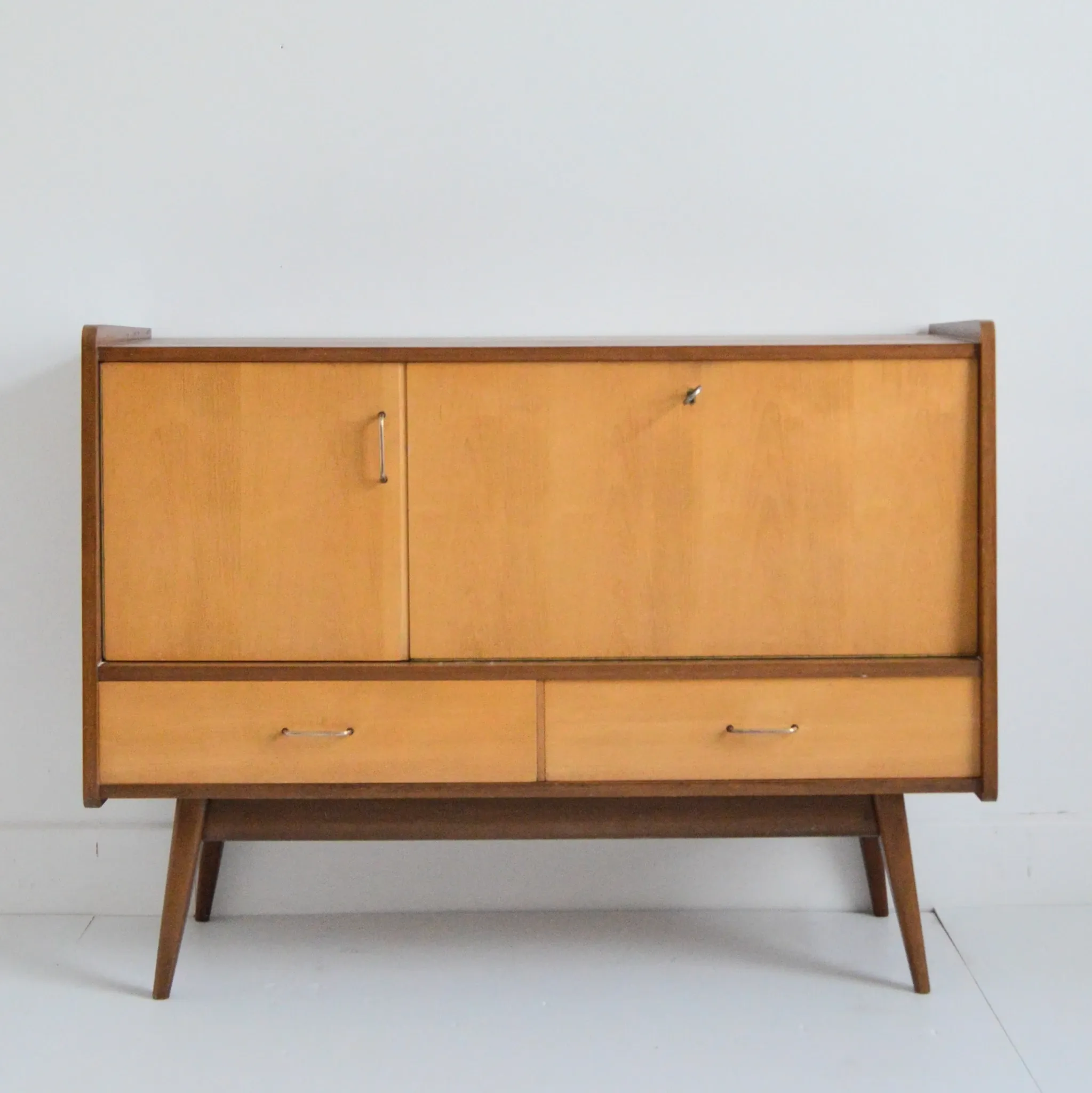 Enfilade / Vintage 1950s bar cabinet with compass legs