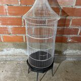 Antique black & white metal bird cage on vintage decorative legs