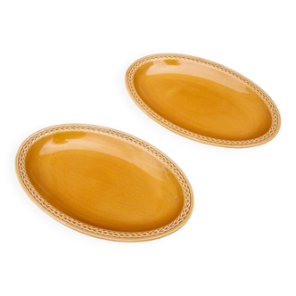 2 golden yellow oval salt dishes