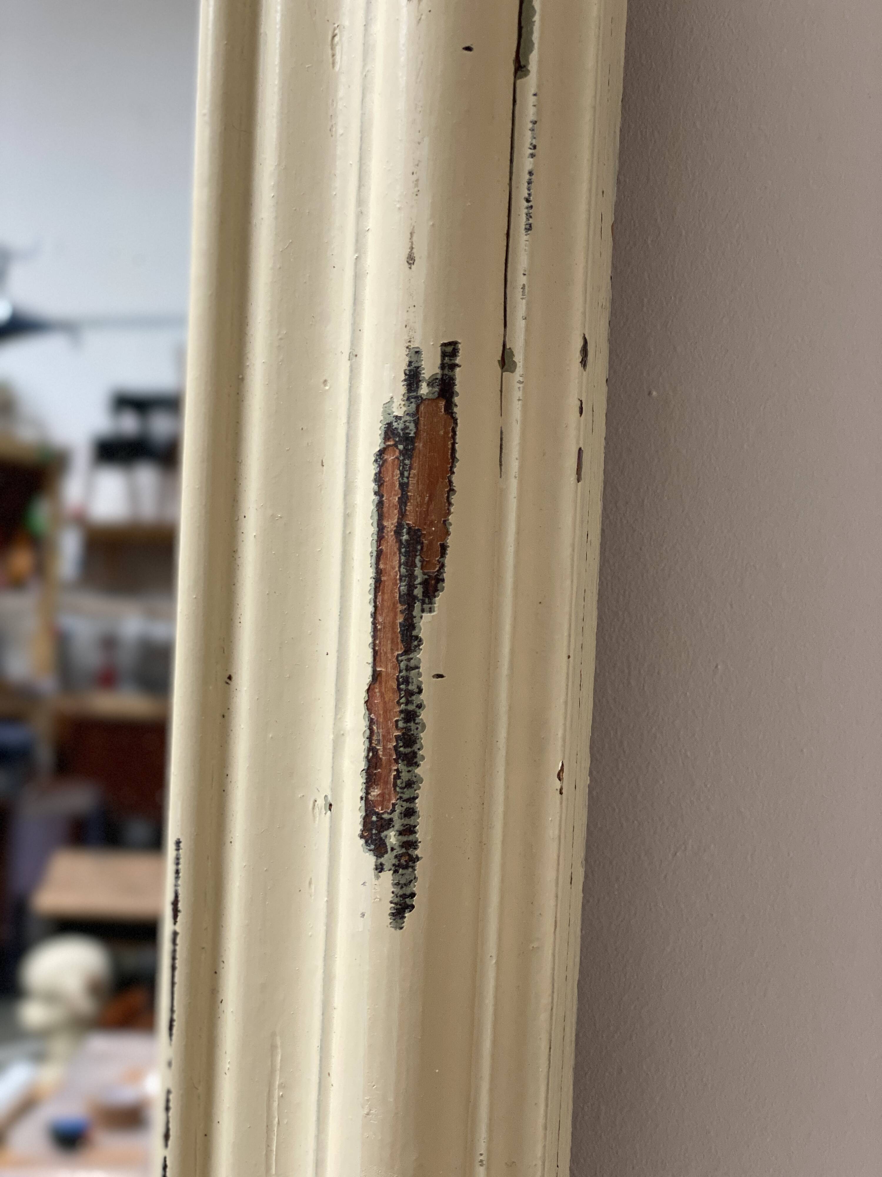 Antique mirror with beige patina