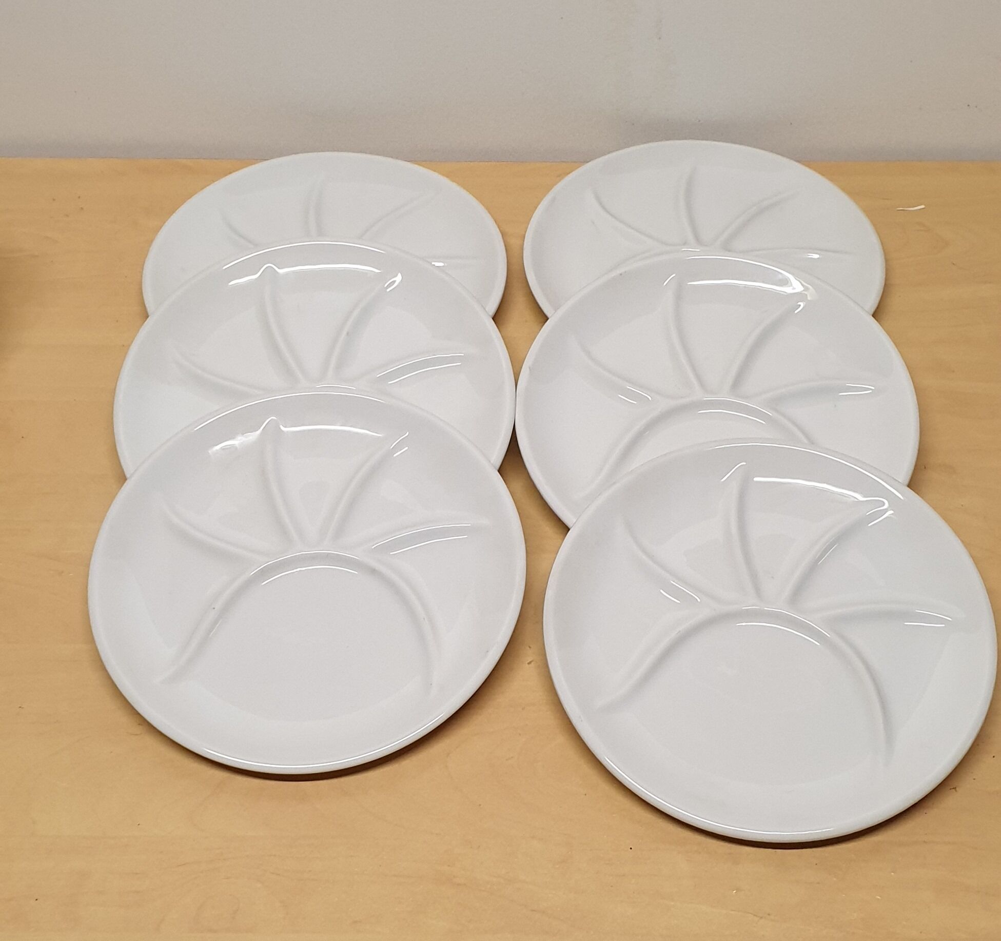 Lot of six porcelain fondue plates