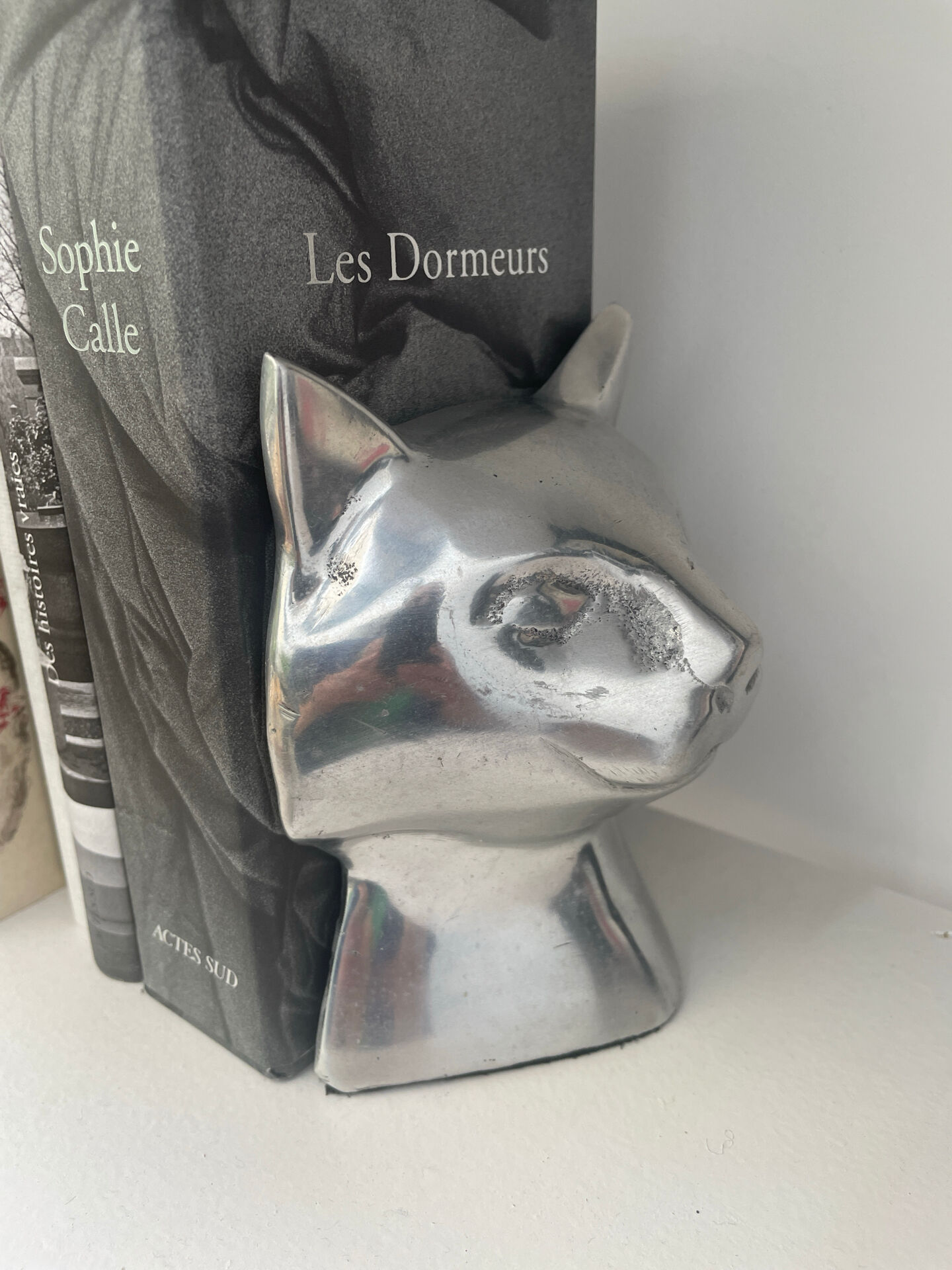 Pair of designer cat head bookends