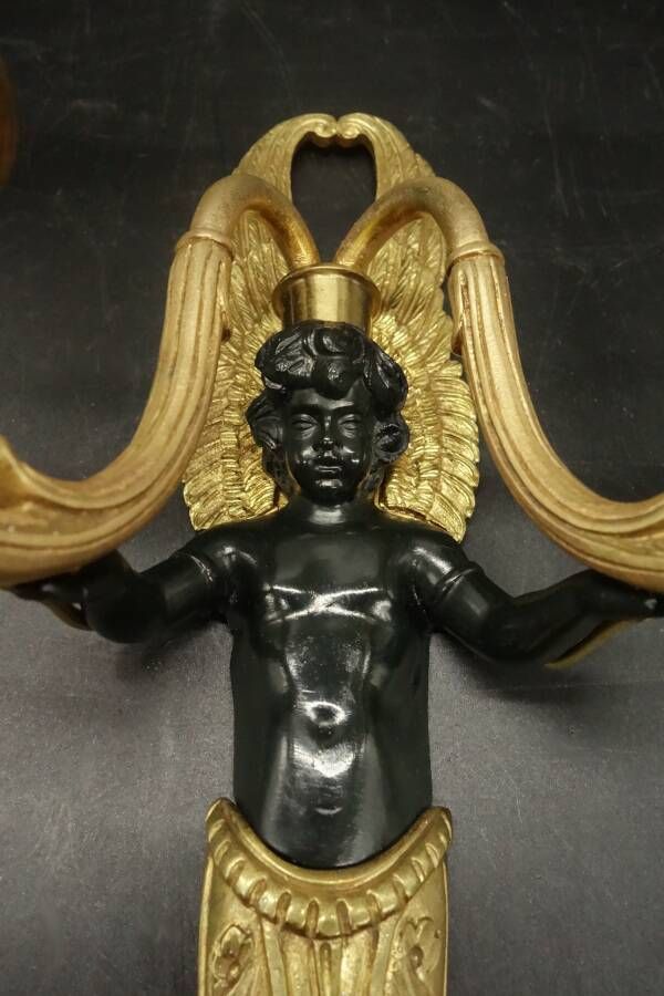 Pair of winged putti wall sconces in Louis XVI style - gilded bronze and black patina