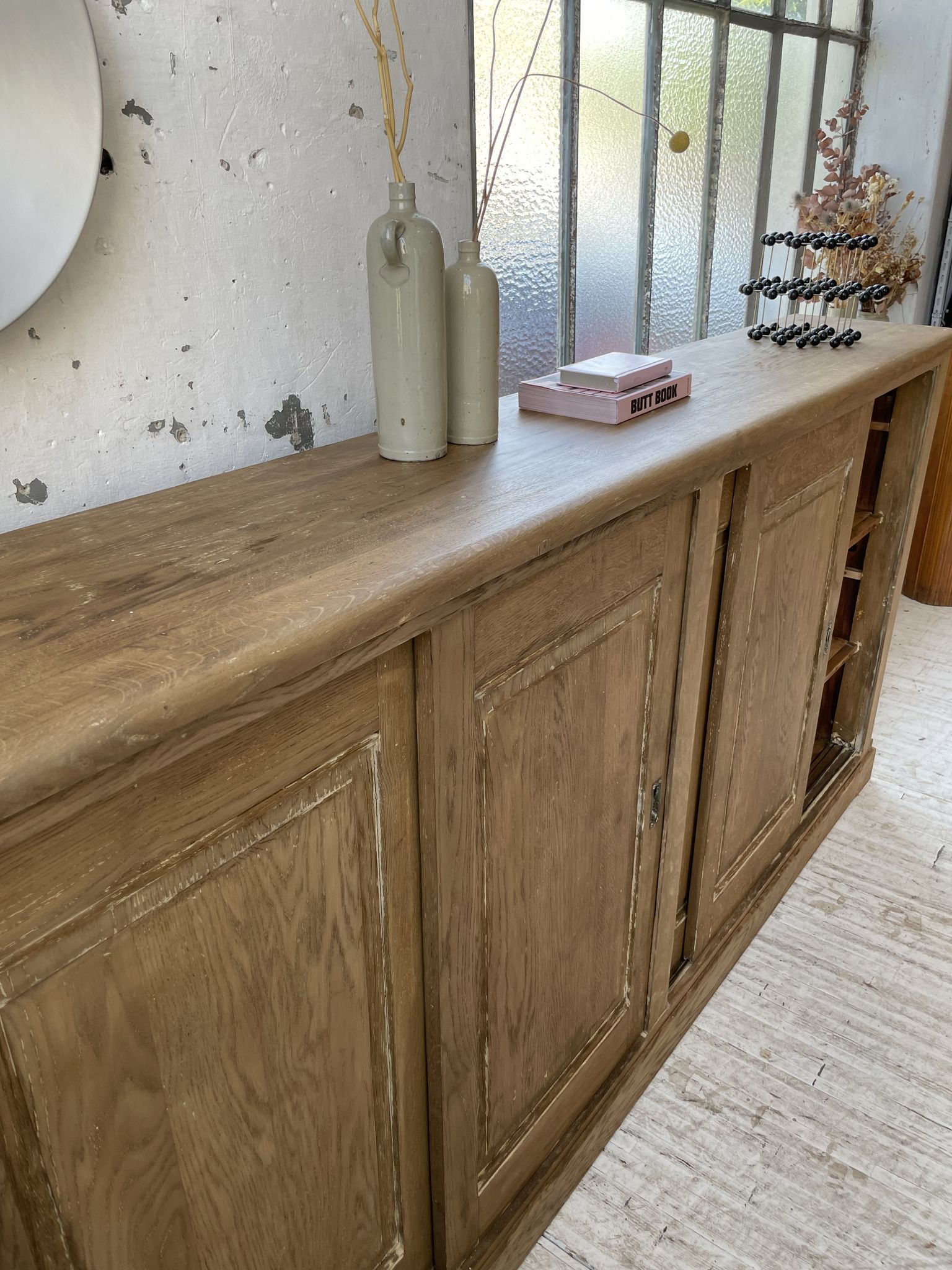 Large row of solid oak loom sliding doors