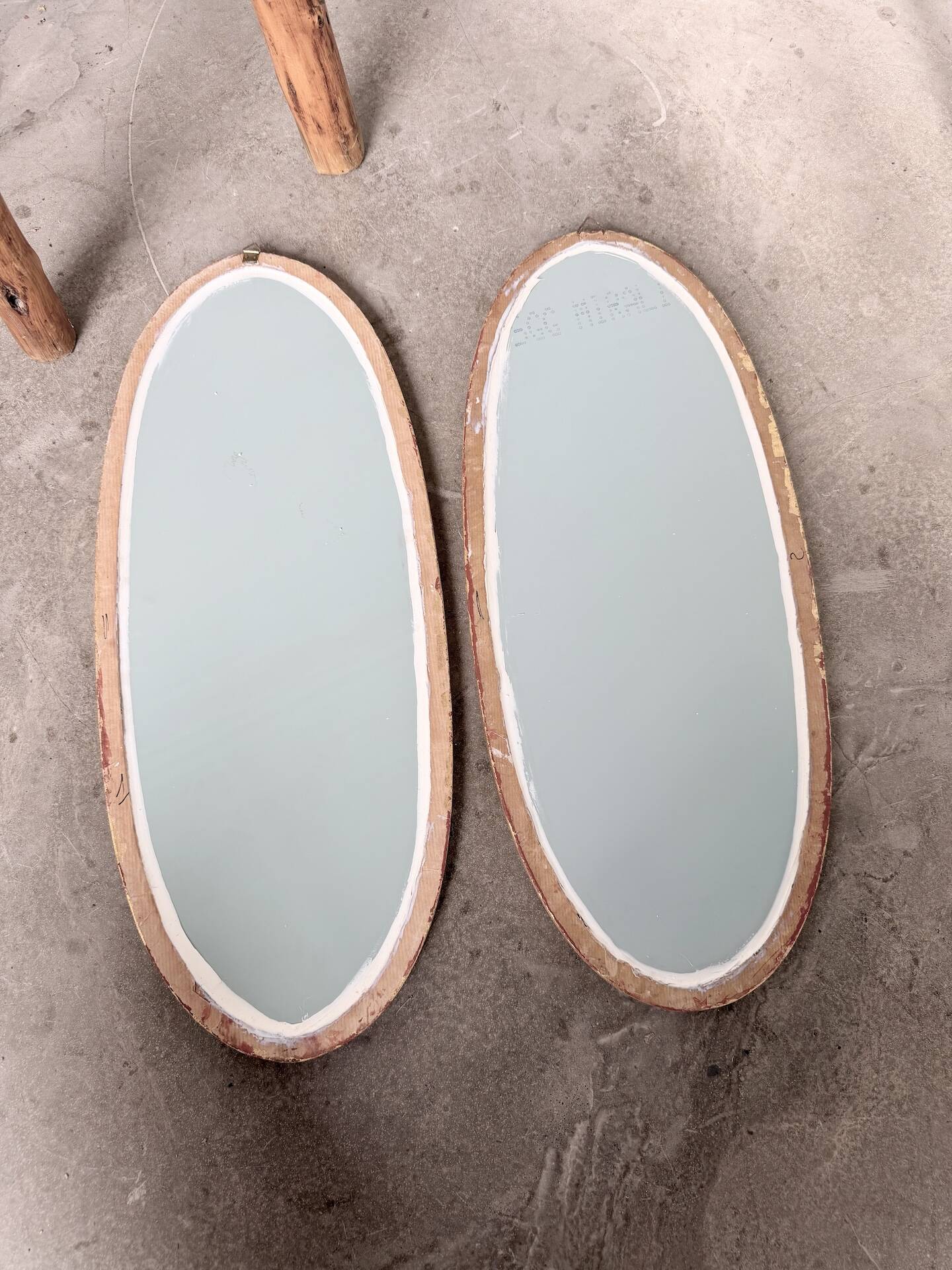 Pair of oval mirrors 1900 gilded stucco