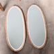 Pair of oval mirrors 1900 gilded stucco