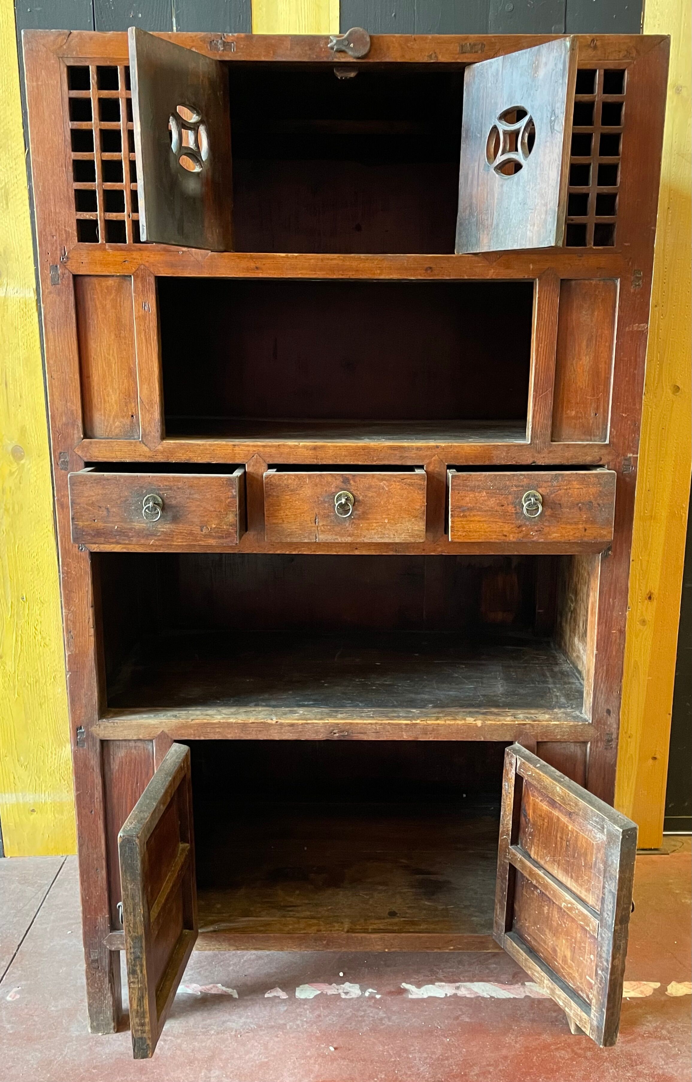 Chinese vessel cabinet 19th century in elm wood