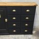 One-door workshop unit with eight black and gold drawers