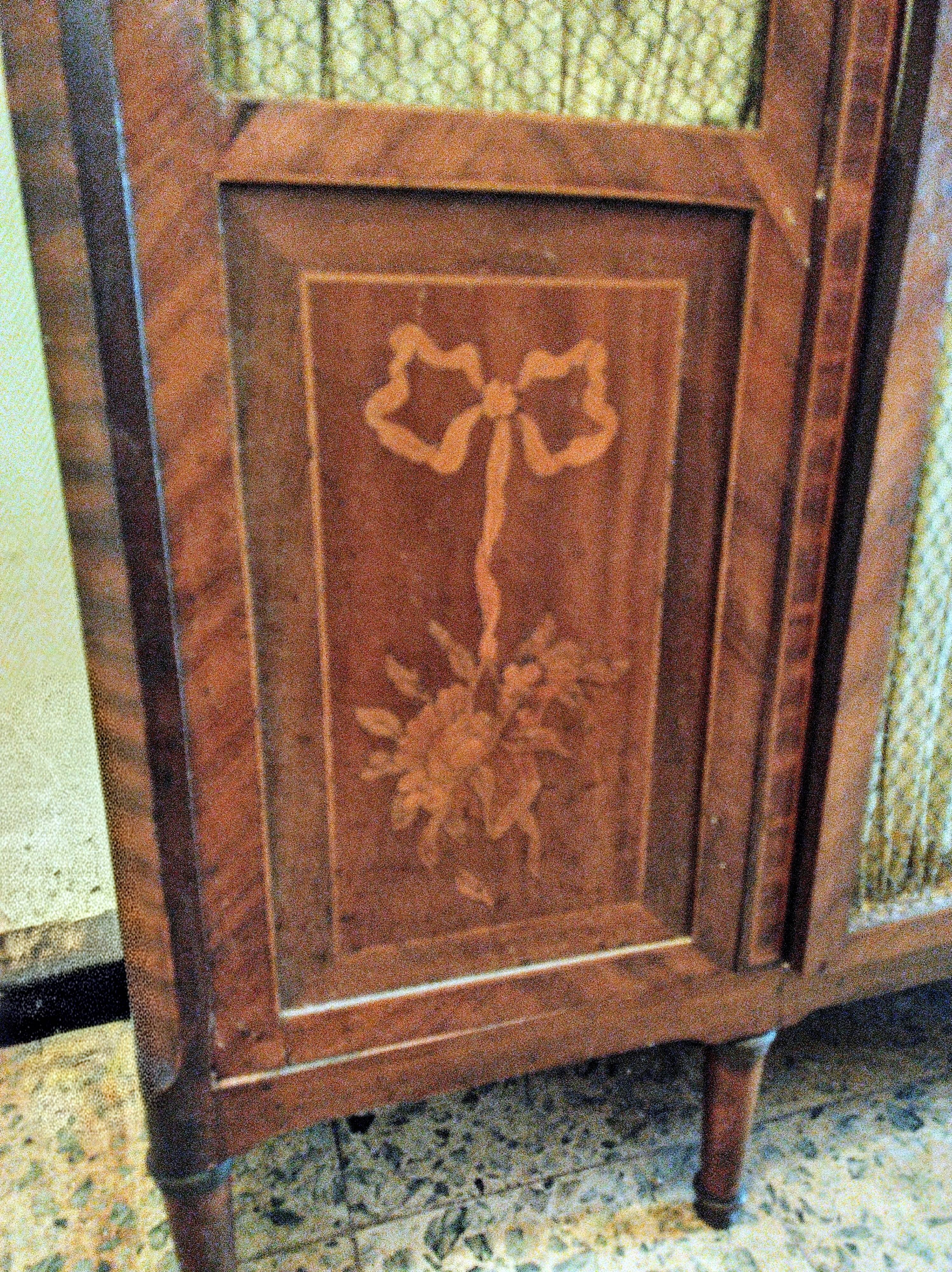 Antique wardrobe in Louis XVI style